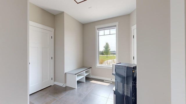 mudroom with light tile patterned floors