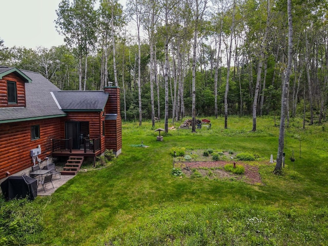 view of yard featuring a deck