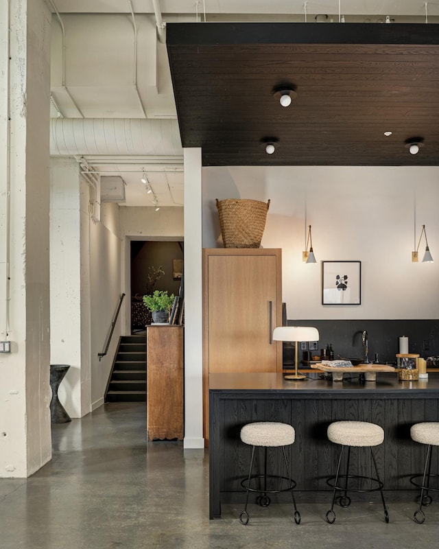 kitchen featuring hanging light fixtures and a breakfast bar area