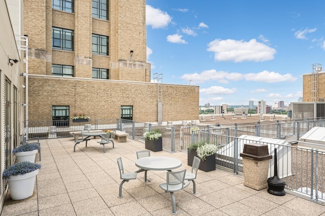 view of patio / terrace with a balcony