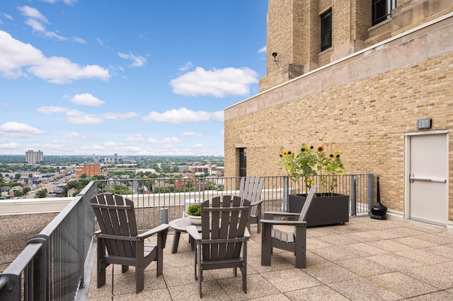 view of patio with a balcony