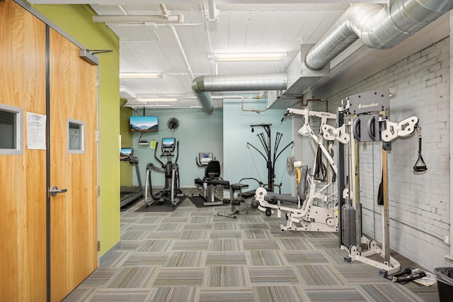 exercise room featuring carpet floors