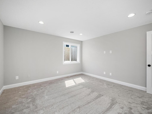 spare room featuring carpet floors