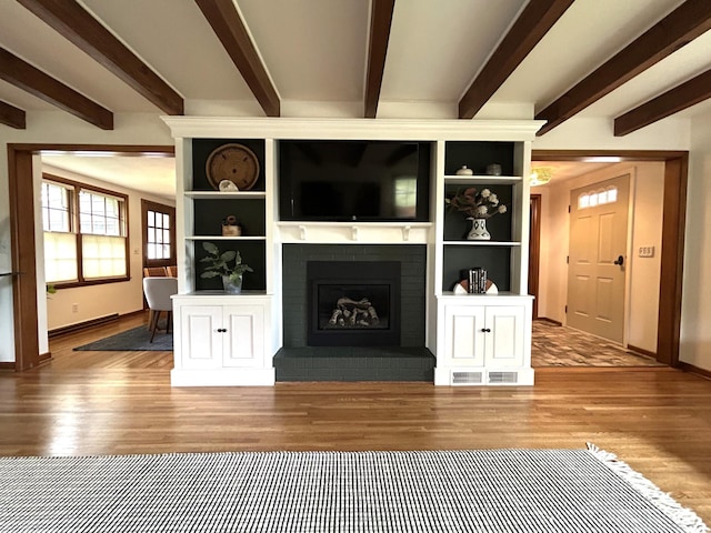 1324 Ridgeview Dr, Montevideo, MN 56265 - unfurnished living room with a fireplace, baseboards, and wood finished floors