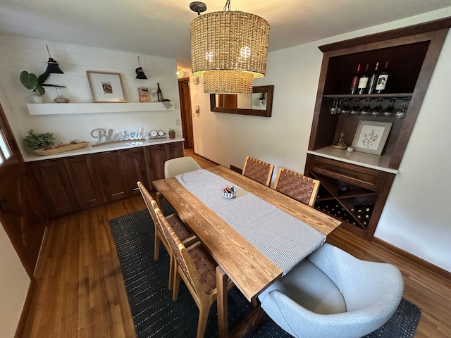 1324 Ridgeview Dr, Montevideo, MN 56265 - dining area featuring dark wood-type flooring and a chandelier