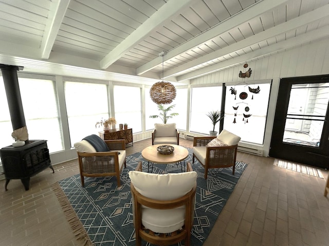 1324 Ridgeview Dr, Montevideo, MN 56265 - interior space featuring vaulted ceiling with beams and a wood stove