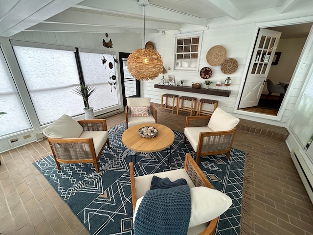 1324 Ridgeview Dr, Montevideo, MN 56265 - sunroom featuring a baseboard radiator and beam ceiling