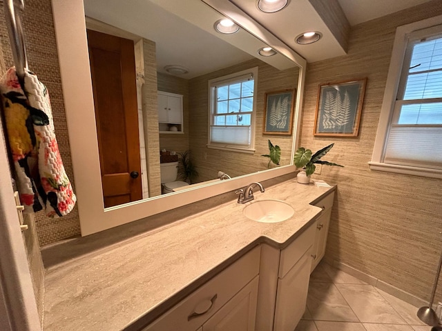 1324 Ridgeview Dr, Montevideo, MN 56265 - bathroom with recessed lighting, tile patterned floors, toilet, vanity, and wallpapered walls
