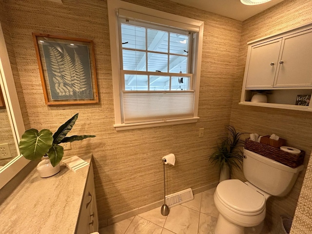 1324 Ridgeview Dr, Montevideo, MN 56265 - half bath featuring toilet, baseboards, and vanity
