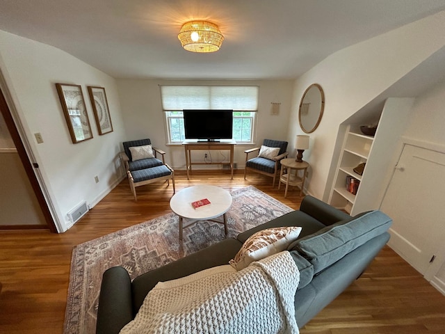 1324 Ridgeview Dr, Montevideo, MN 56265 - living area featuring wood finished floors, visible vents, and baseboards