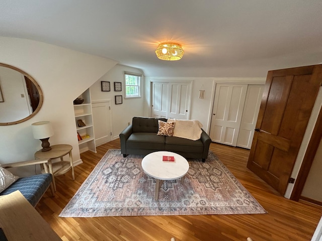 1324 Ridgeview Dr, Montevideo, MN 56265 - living room featuring lofted ceiling and wood finished floors