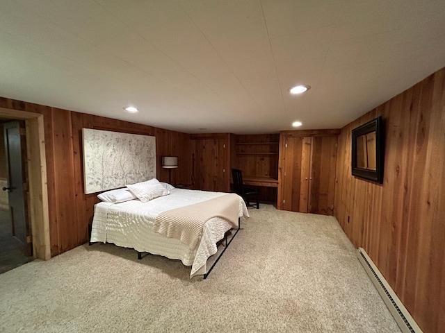1324 Ridgeview Dr, Montevideo, MN 56265 - carpeted bedroom with a baseboard heating unit, recessed lighting, and wooden walls