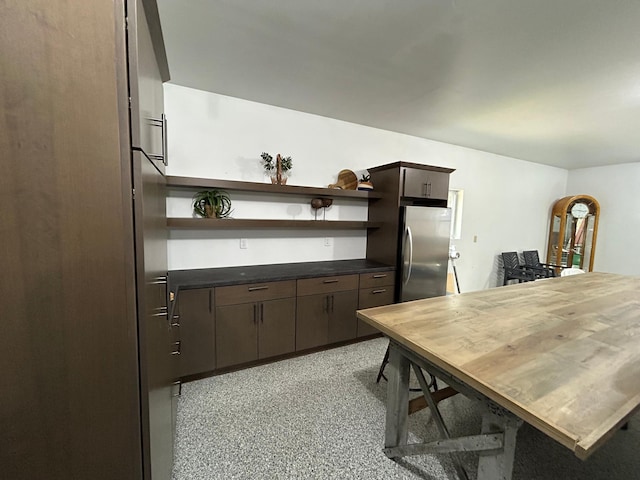 1324 Ridgeview Dr, Montevideo, MN 56265 - kitchen with open shelves, dark brown cabinets, and freestanding refrigerator