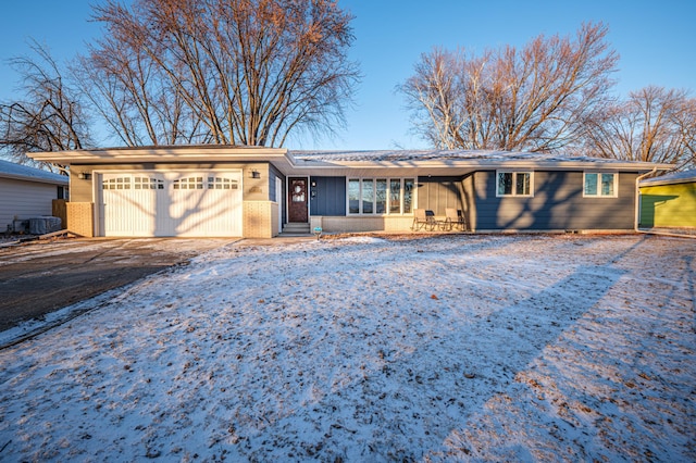 ranch-style home with a garage