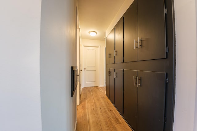 hallway featuring light hardwood / wood-style flooring