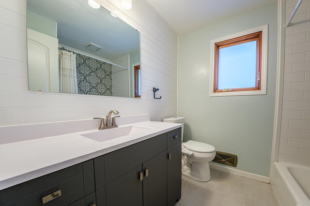 full bathroom with toilet, shower / bath combination with curtain, tile patterned floors, and vanity