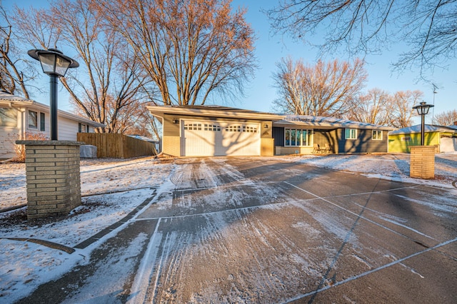 view of front of property with a garage