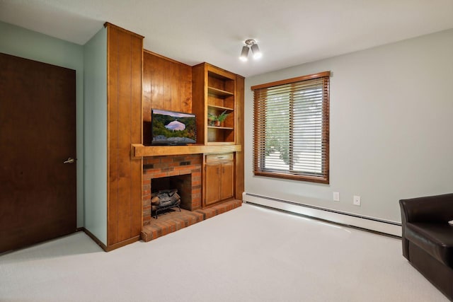 living room with carpet flooring, a brick fireplace, and baseboard heating