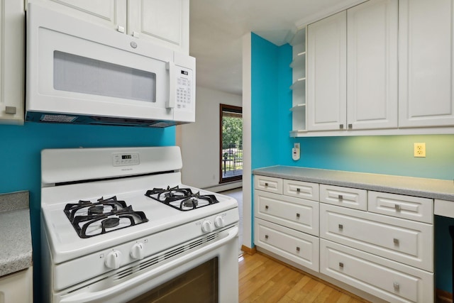 kitchen with light wood-type flooring, white appliances, white cabinets, and baseboard heating