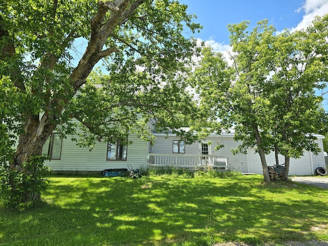 exterior space with a front lawn