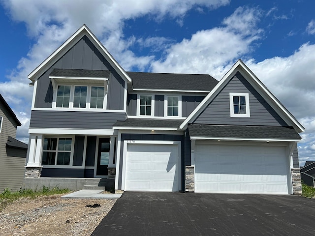 craftsman-style home featuring a garage