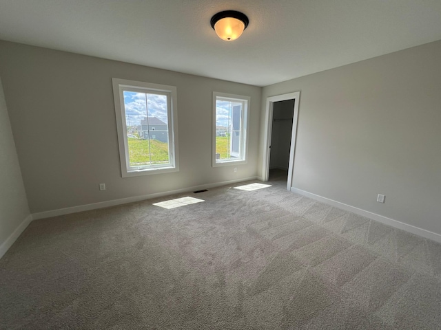 view of carpeted spare room