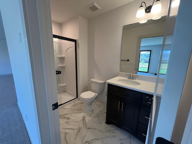 full bathroom featuring toilet, vanity, visible vents, and a stall shower