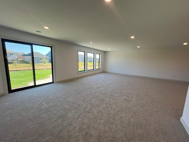 empty room featuring carpet flooring