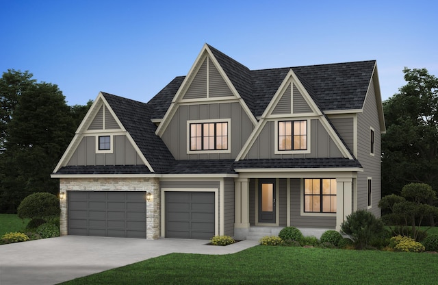 view of front facade featuring a garage and a front yard