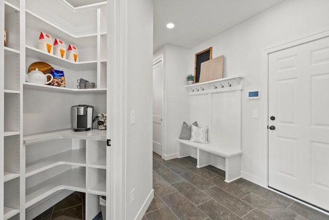 mudroom featuring baseboards and recessed lighting