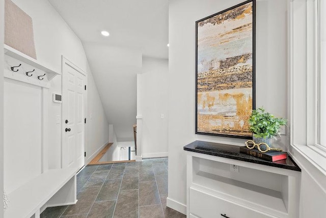 mudroom with baseboards and recessed lighting