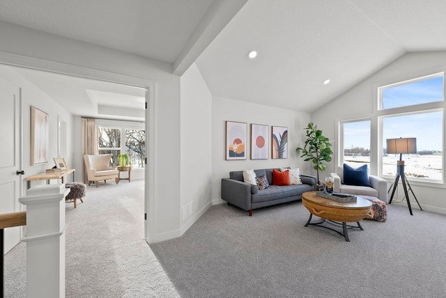 carpeted living room featuring vaulted ceiling, recessed lighting, and baseboards