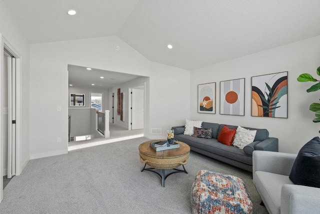 living room with lofted ceiling, visible vents, carpet, and recessed lighting