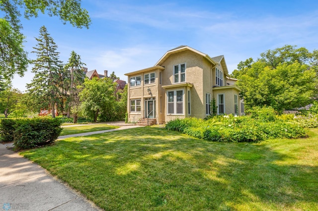 view of front of house with a front yard