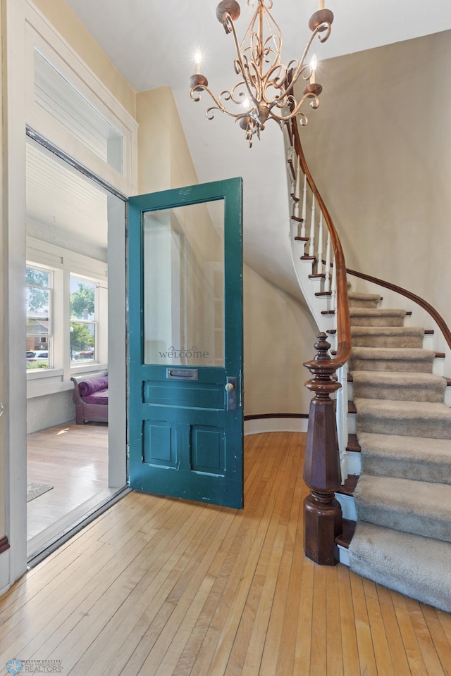 foyer entrance with hardwood / wood-style floors