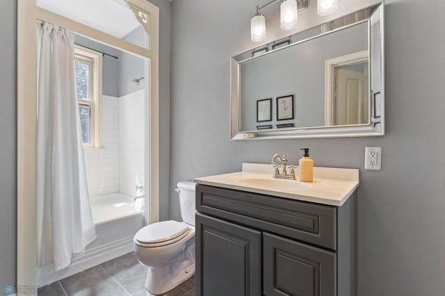 full bathroom with tile patterned flooring, vanity, shower / bathtub combination with curtain, and toilet