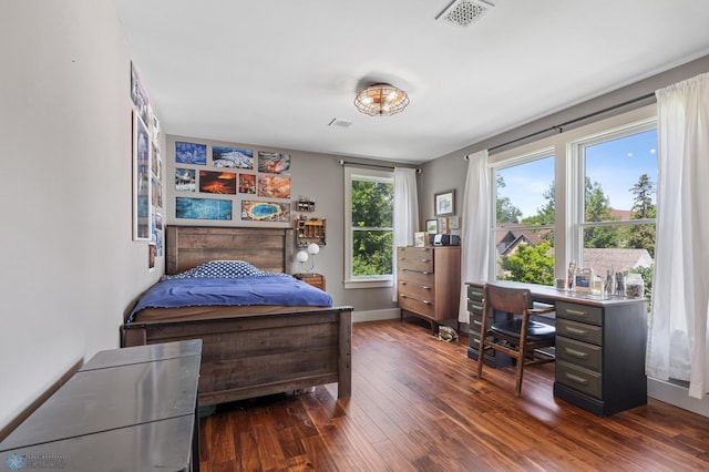 bedroom featuring dark wood-type flooring