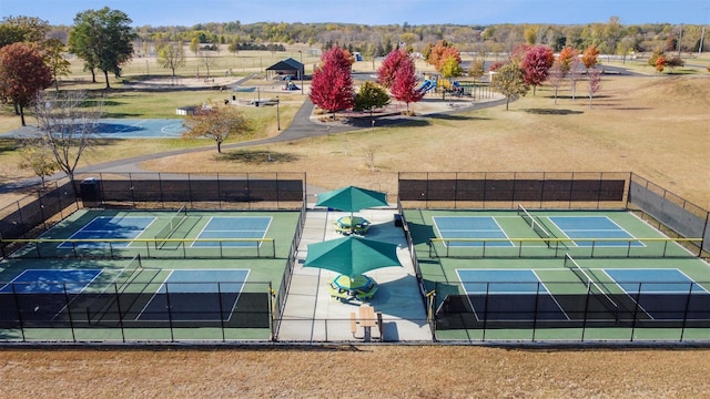 view of sport court with fence