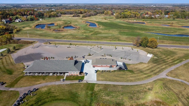 birds eye view of property featuring view of golf course