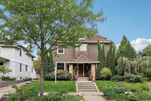 2410 Irving Ave S, Minneapolis, MN 55405 - view of front of property with a front yard and roof with shingles
