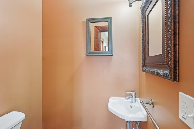 2410 Irving Ave S, Minneapolis, MN 55405 - half bath with toilet and a sink