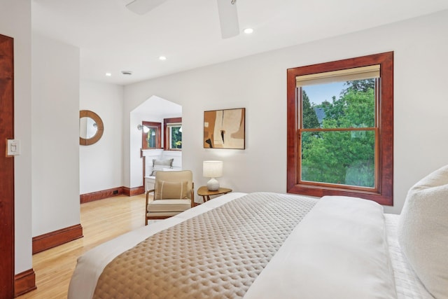 2410 Irving Ave S, Minneapolis, MN 55405 - bedroom with light wood-type flooring, baseboards, recessed lighting, and a ceiling fan