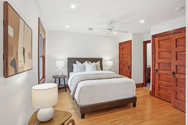 2410 Irving Ave S, Minneapolis, MN 55405 - bedroom with light wood-style floors, recessed lighting, and ceiling fan
