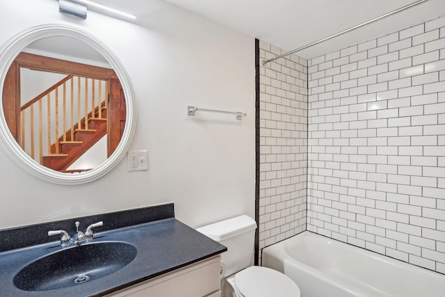 2410 Irving Ave S, Minneapolis, MN 55405 - bathroom featuring toilet, vanity, and  shower combination
