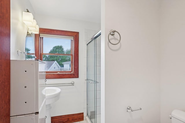 2410 Irving Ave S, Minneapolis, MN 55405 - full bath with a shower stall and toilet