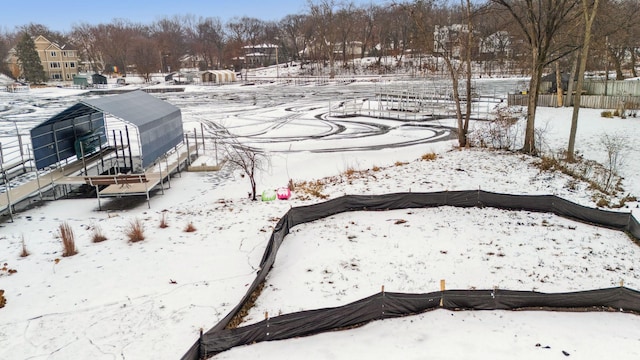 view of yard covered in snow