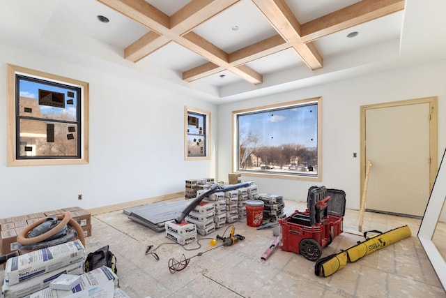 miscellaneous room with plenty of natural light, coffered ceiling, and beamed ceiling