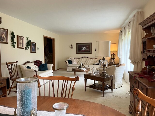 interior space featuring light colored carpet