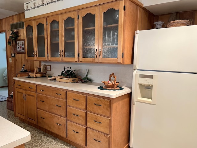 kitchen featuring white fridge and light tile patterned floors