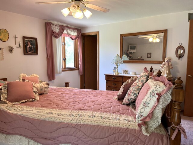 bedroom featuring ceiling fan and carpet floors